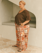 The Lullaby Club Gia Crop in Brown Crepe – Oversized, lightweight crop top made from breathable Viscose-Cotton blend. Pregnancy and breastfeeding-friendly with discreet feeding ties, perfect for effortless maternity and postpartum fashion.