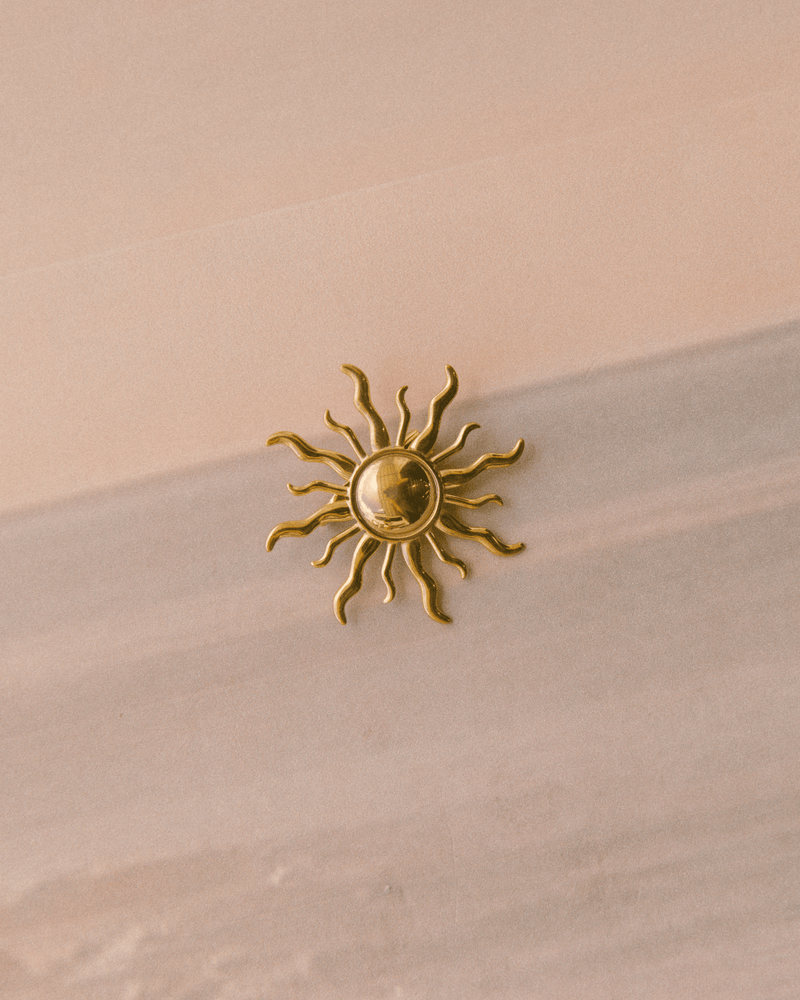 Golden Sunburst Brooch