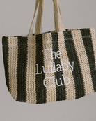 Raffia striped tote bag in black with The Lullaby Club embroidered on the front.